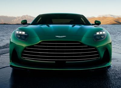 Front view with wide grille and LED headlights