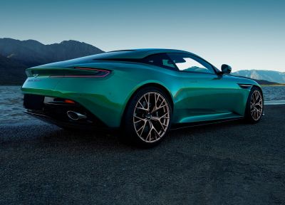 Rear and side profile with aerodynamic curves, taillights, and sporty rims