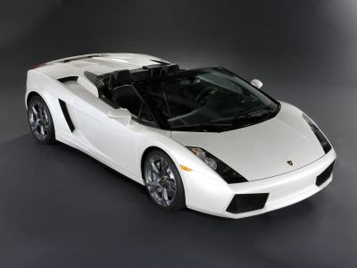 White convertible sports car with sleek front and open top
