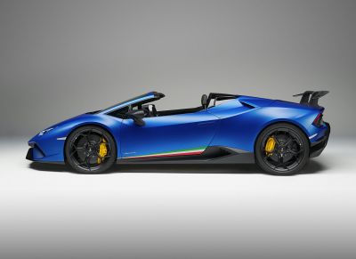 Convertible coupe with prominent rear wing and yellow brake calipers