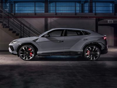 Side profile of angular SUV with sporty alloy wheels and red brake calipers