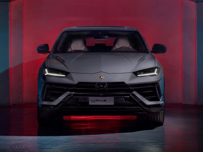 Aggressive front view with sharp headlights and sporty grille