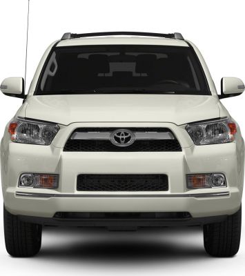 Front view with dual headlights, grille, and fog lights in SUV style