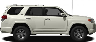 White SUV side profile with tinted windows, roof rails, and alloy wheels