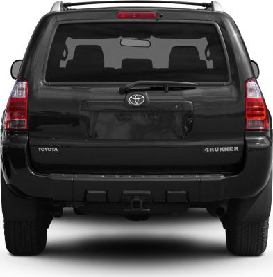 Rear view of SUV with rear wiper, tail lights, and large rear window