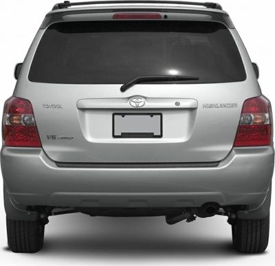 Rear view with badges, windshield wiper, taillights, and roof rack
