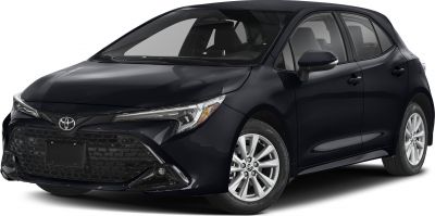 Sleek black hatchback with large front grille and LED headlights