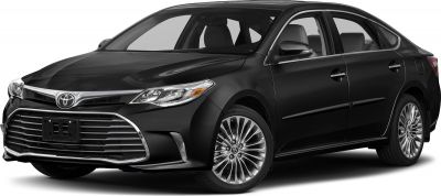 Black sedan with chrome grille and multi-spoke alloy wheels