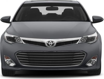 Front view showing grille, headlights, fog lights, and side mirrors