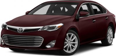 Wide chrome grille and multi-spoke alloy wheels on a mid-size sedan.