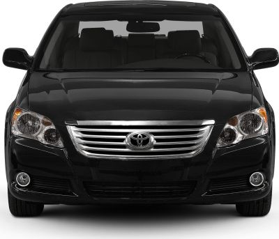 Front grille and headlight close-up of mid-2000s sedan