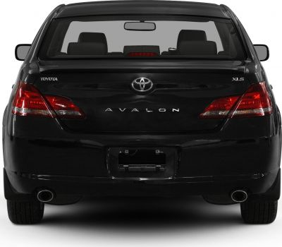 Rear view with distinctive taillights and dual exhaust tips