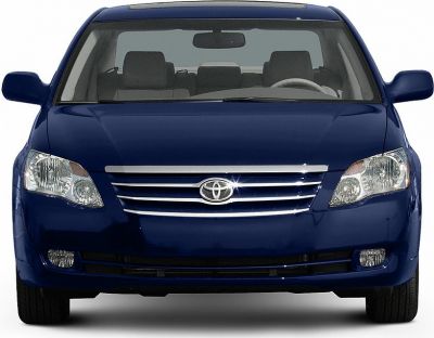 Front view with chrome grille and headlights