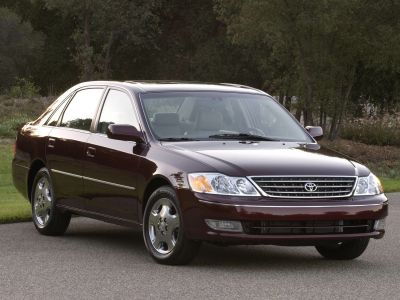 Chrome front grille with clear headlights and integrated turn signals