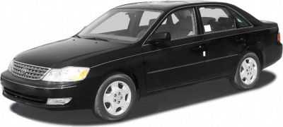 Black four-door sedan with alloy wheels and front side view