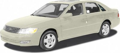 Beige sedan with front side view, alloy wheels, aerodynamic design