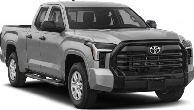 Double cab pickup with long bed and bold black front grille