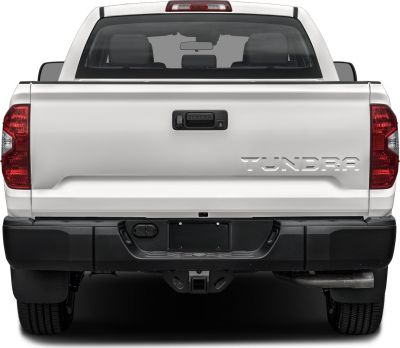 Rear view of pickup tailgate, tail lights, and towing hitch