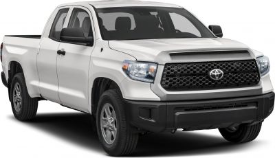 Front three-quarter view of midsize pickup with CrewMax cab and honeycomb grille