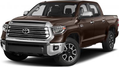 Chrome front grille with Toyota emblem and stylish alloy wheels.