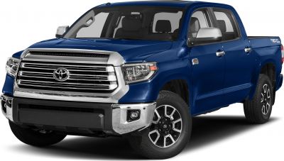 Large pickup truck front grille and alloy wheels in blue paint