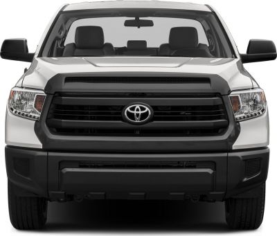 Front view of a truck with prominent grille and rectangular headlights
