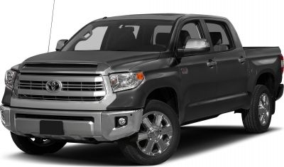 Front profile with chrome grille and dual headlights