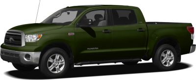 Side profile of dark green pickup with CrewMax extended cab and alloy wheels