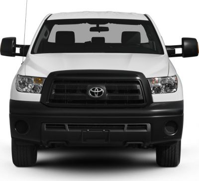 Front grille and headlights of a truck with side mirrors extended