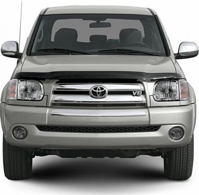 Front view of a truck with chrome grille and V8 badge
