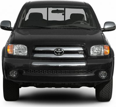 Front view of pickup truck grille, headlights, and fog lights
