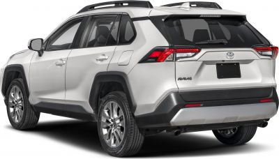 Rear side view with taillights, alloy wheels, roof rails, and rugged cladding.