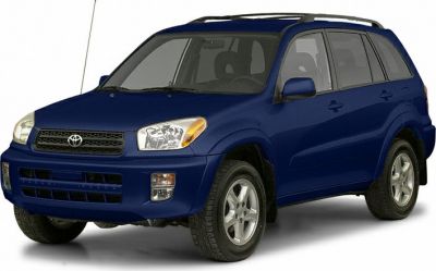 Front side view of blue 5-door SUV with alloy wheels and prominent grille.