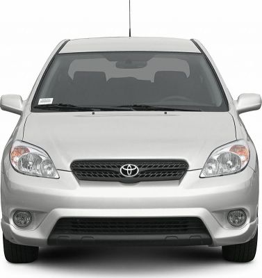 Front view with distinctive headlights and grille of a compact hatchback