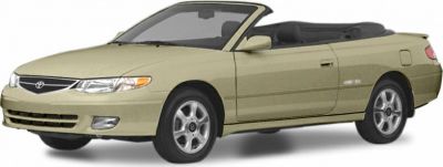 Front side view of 2001 convertible with beige body and soft top