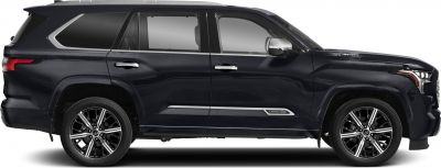 Side profile of large SUV with distinct alloy wheels and Capstone trim badge