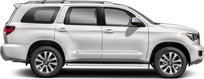 Side view of a large silver SUV with alloy wheels and tinted windows