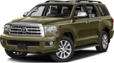 Large SUV with prominent chrome grille and silver alloy wheels