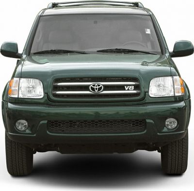 Front view showing V8 grille, headlights, and fog lights of an SUV.