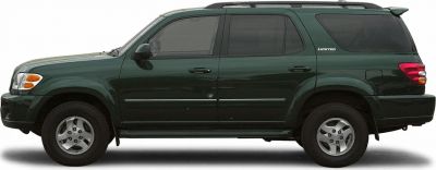 SUV side profile with roof rails, tinted windows, and rear spoiler