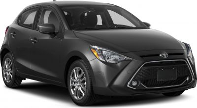 Front side view with modern headlights and large grille