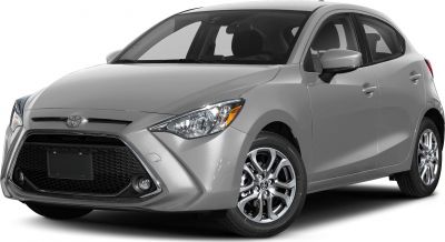Front angled view with sharp headlights and aggressive grille