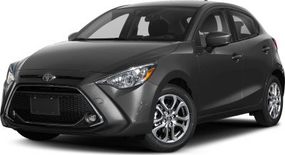 Front view of a compact hatchback with sleek headlights and alloy wheels