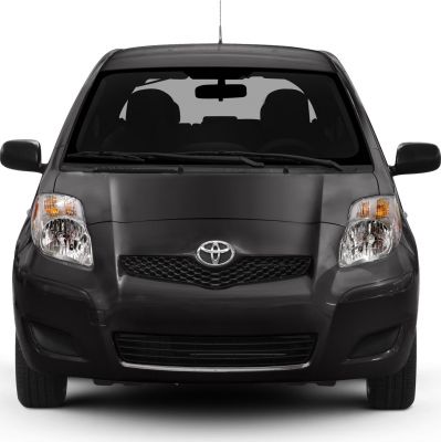 Symmetrical compact car front with black grille and headlights