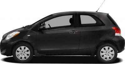 Side view of a compact two-door hatchback with a sleek, streamlined silhouette.