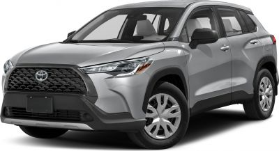 Front side view of a compact SUV with bold grille and sleek headlights