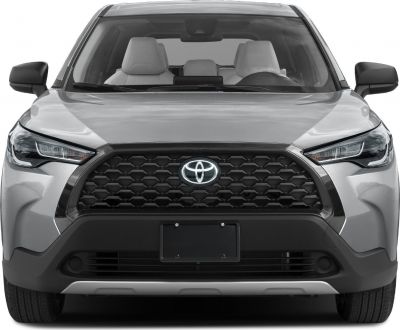 Front view with black honeycomb grille and sharp LED headlights