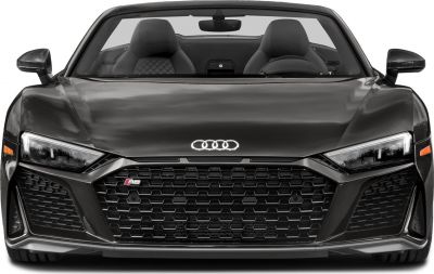 Front view with aggressive grille and sleek headlights of convertible sports car