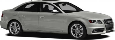 Side profile of a sedan with V8 badge and alloy wheels