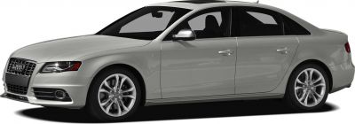 Side front view of silver four-door sedan with alloy wheels